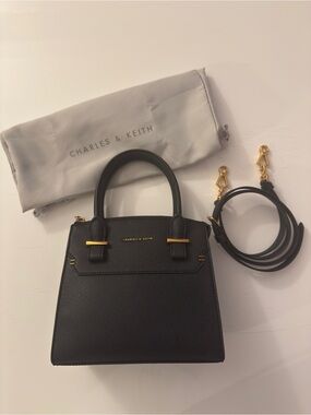 Charles & Keith Black Structured Top-Handle Bag with Gold Zipper Closure